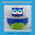 Promotional ceramic utensil holder with owl shape